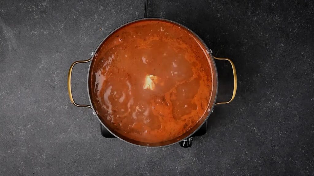 Add stock and sauces
